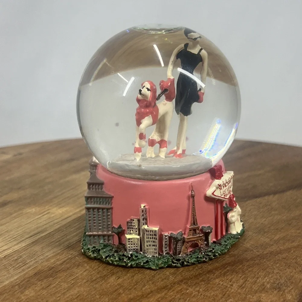 Las Vegas Glitter Snow Globe Landmarks 3.5 Inch.  Woman With Dog Figurine.‎
